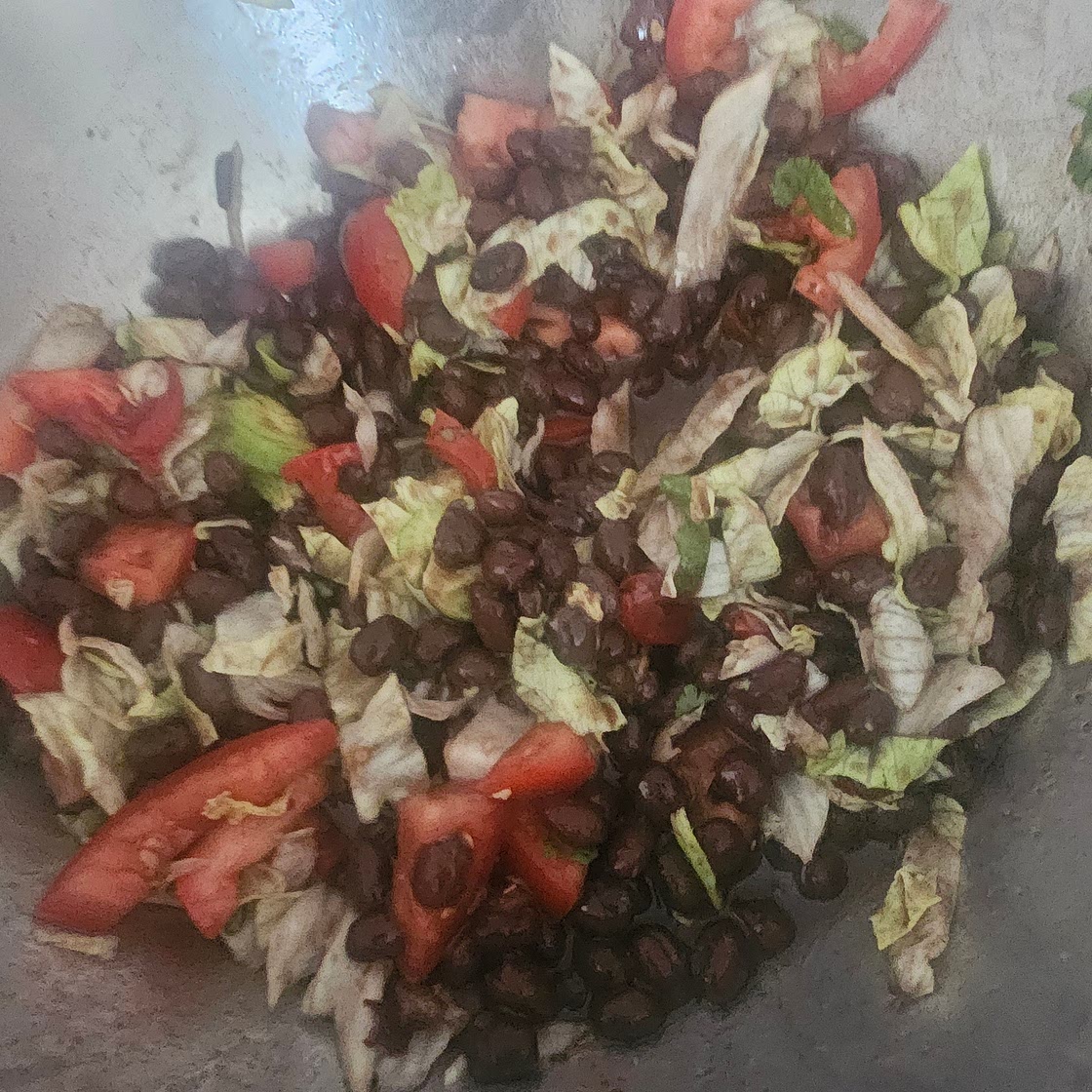 Rice and black beans, salad.