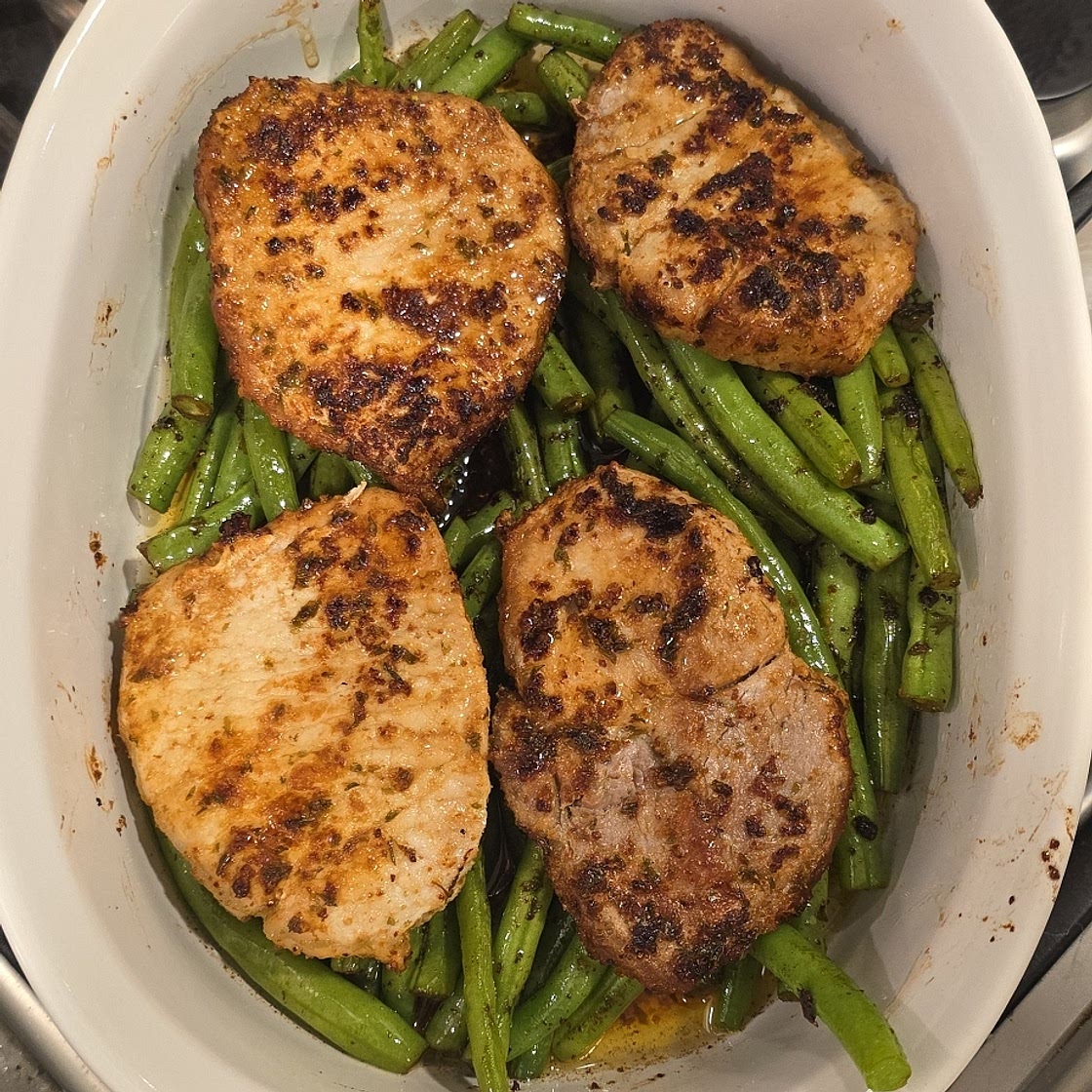 Pork chops with green beans and garlic butter