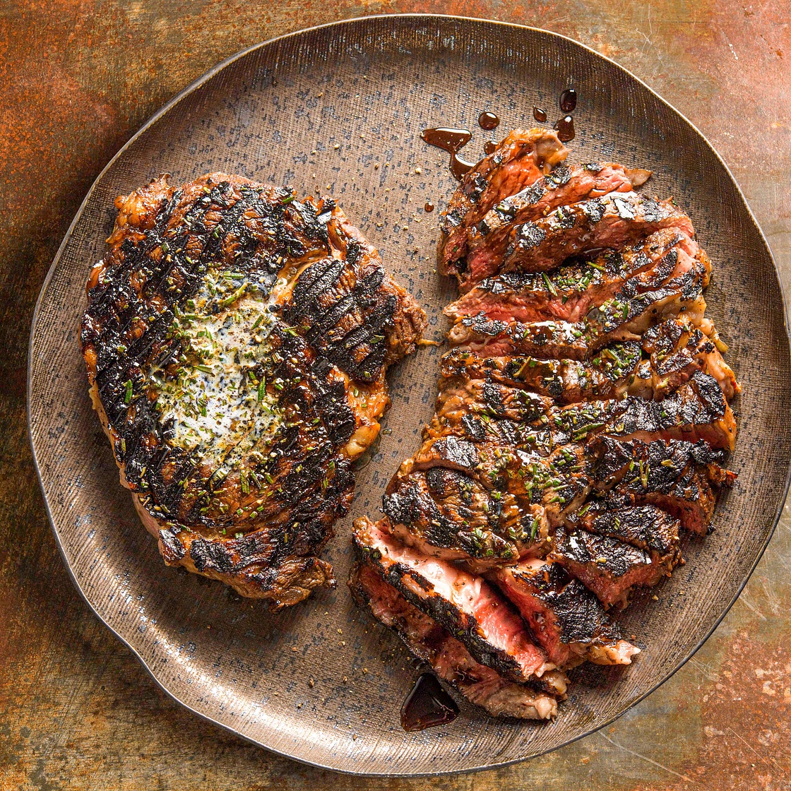 Rib-Eye Steaks with Rosemary and Pomegranate Molasses