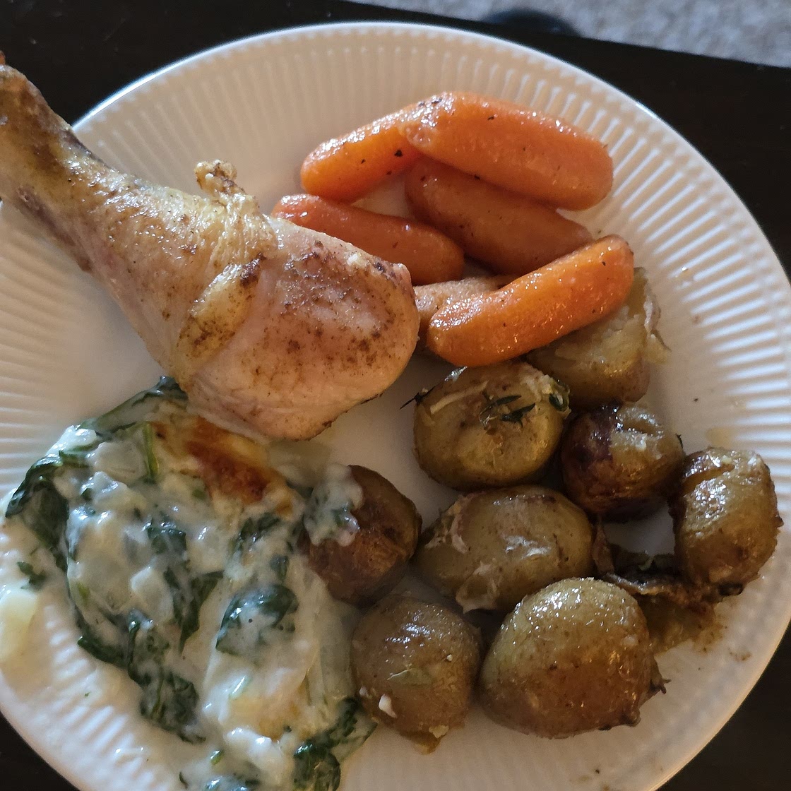 Roast chicken with squashed new potatoes & cheesy creamed spinach
