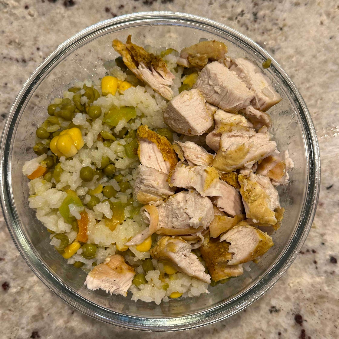 Chicken breast with rice and vegetables.