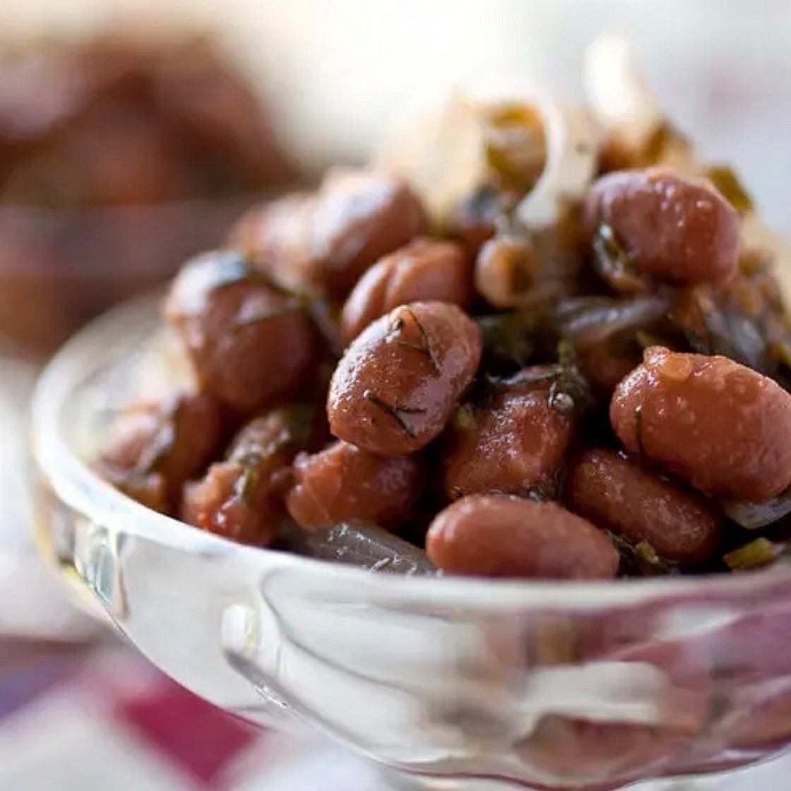 Red beans with red onion and greens. 