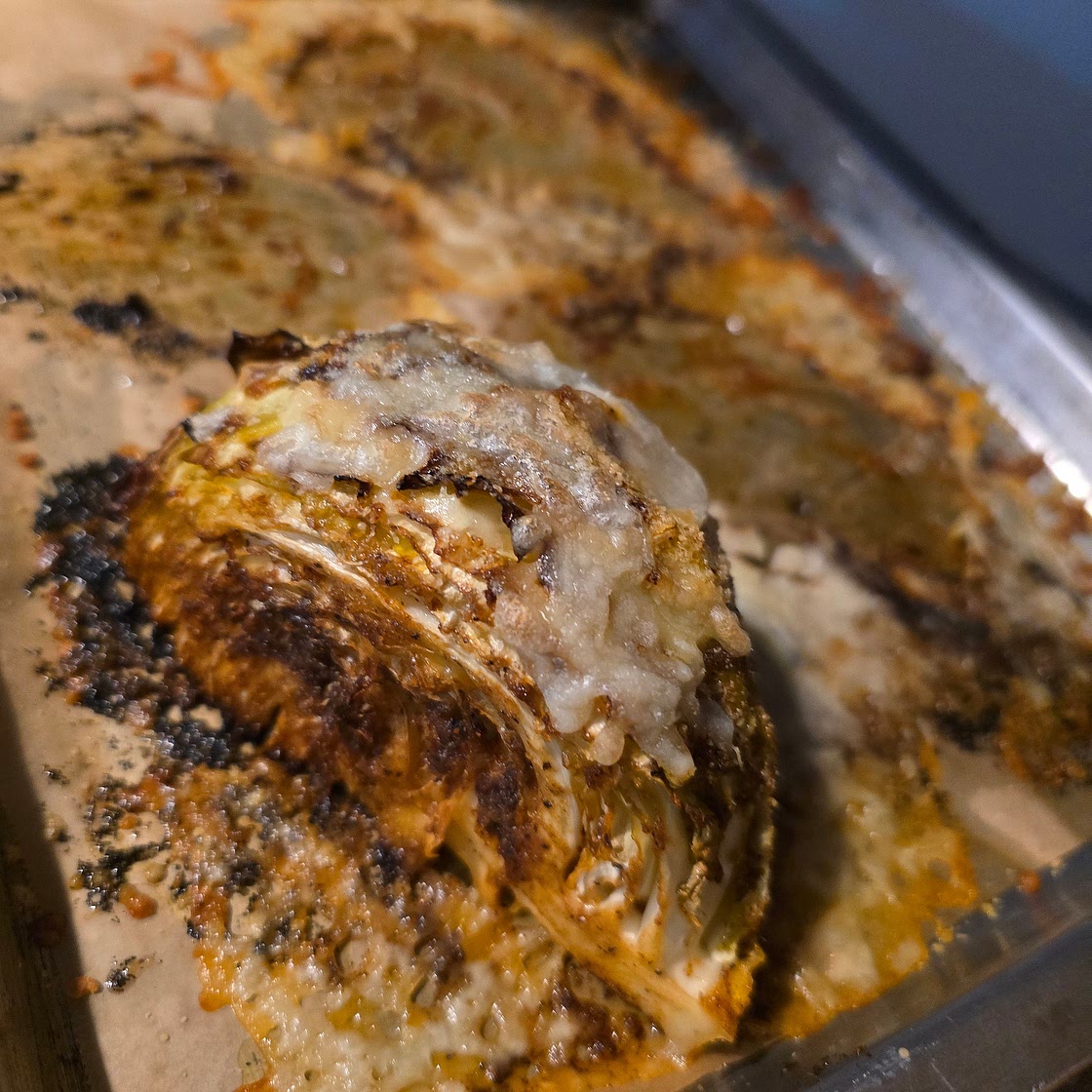Cheesy garlic butter cabbage wedges