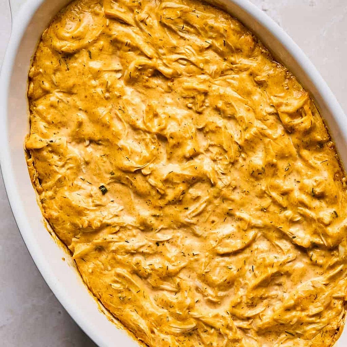 Creamy Buffalo Chicken Stuffed Sweet Potatoes with Crunchy Rainbow Ranch Slaw