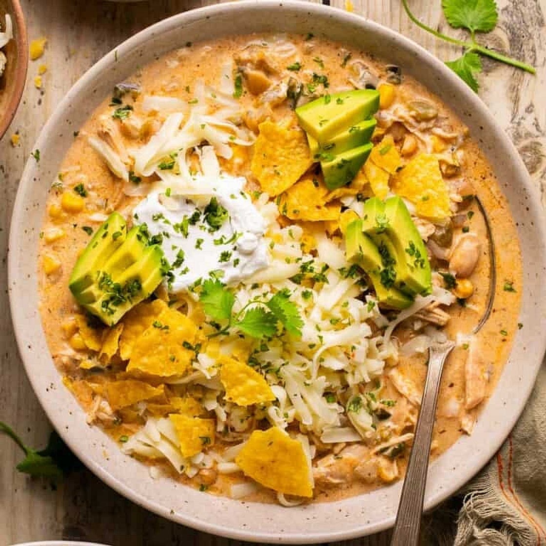 Creamy White Chicken Chili with Cannellini Beans, Sweetcorn, Roasted Peppers & Avocado-Lime Topping