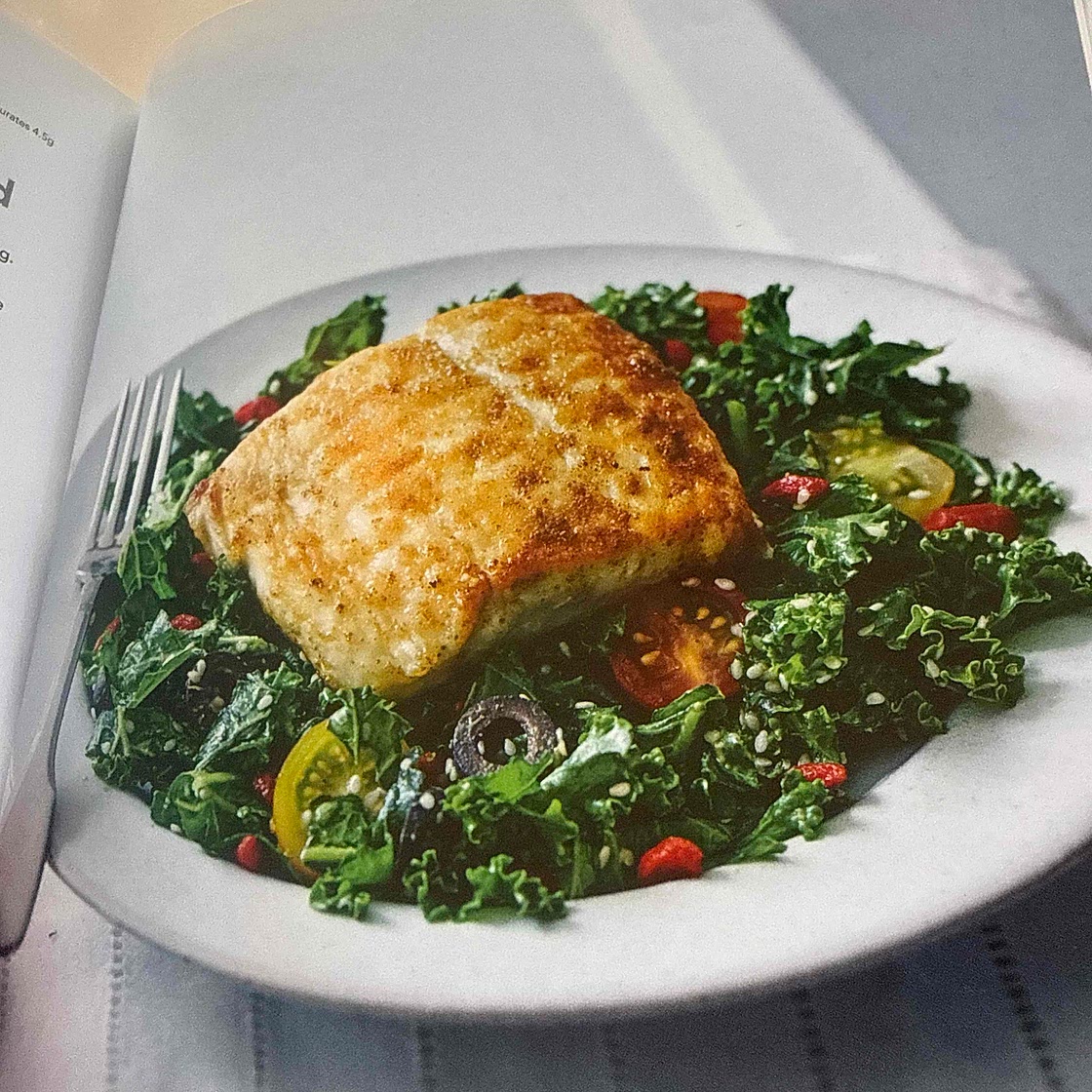 Cumin spiced halibut with kale salad