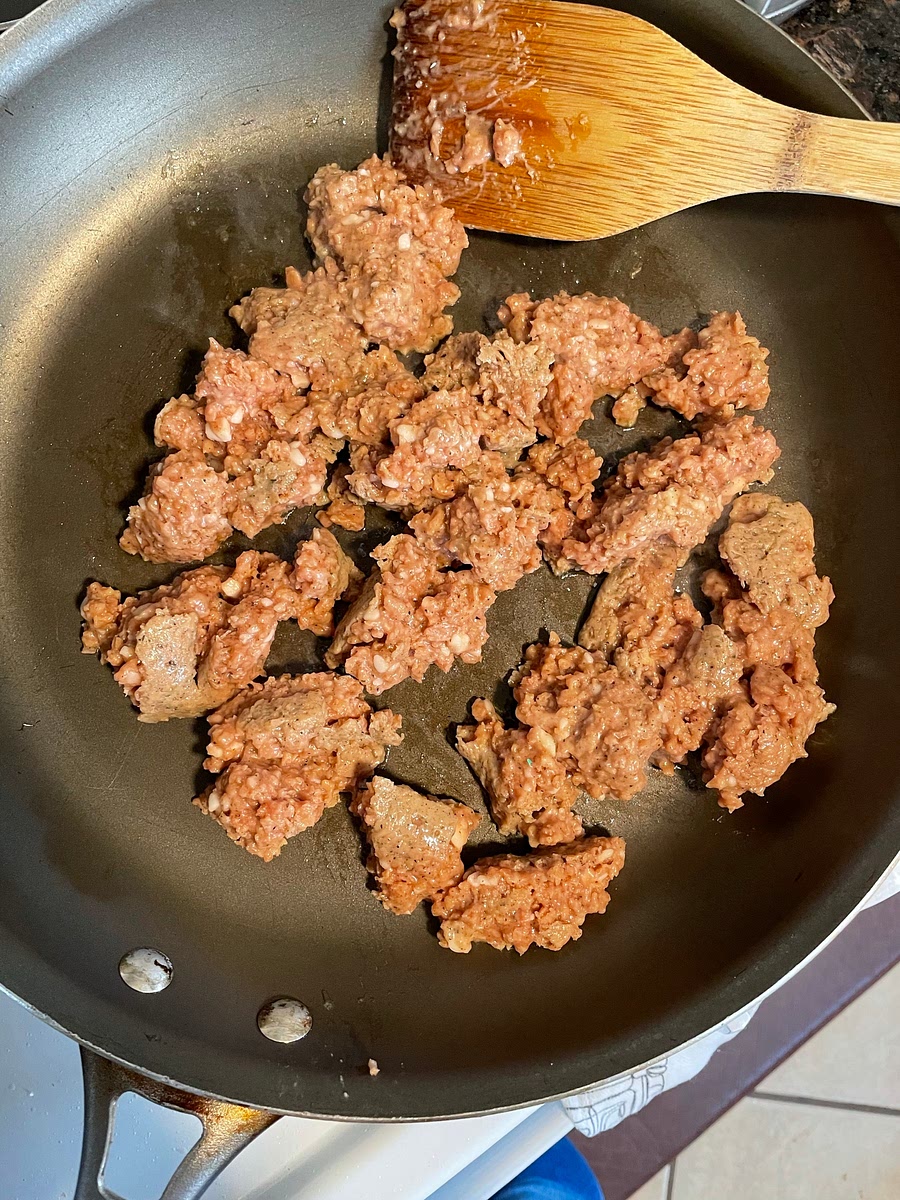 If the vegan sausage is in casings, remove so you can crumble it. If that’s not easy, you can mince it - you want small crumbles. Set a large, heavy-bottomed skillet over medium heat and cook the sausage, breaking it up with a wooden spoon, until it is loose and browned, approximately 7-8 minutes for Impossible sausage (may be different for your brand). Taste sausage and adjust seasonings — you may wish to add paprika, sage and fennel aggressively depending on what flavor you like in your gravy!