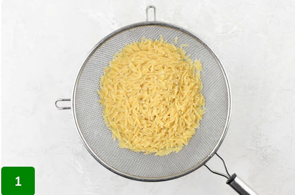 Once water is boiling, add orzo and cook until al dente, 4-5 minutes. Drain in a wire-mesh strainer and set aside. Reserve pot; no need to wipe clean. While orzo cooks, prepare ingredients.