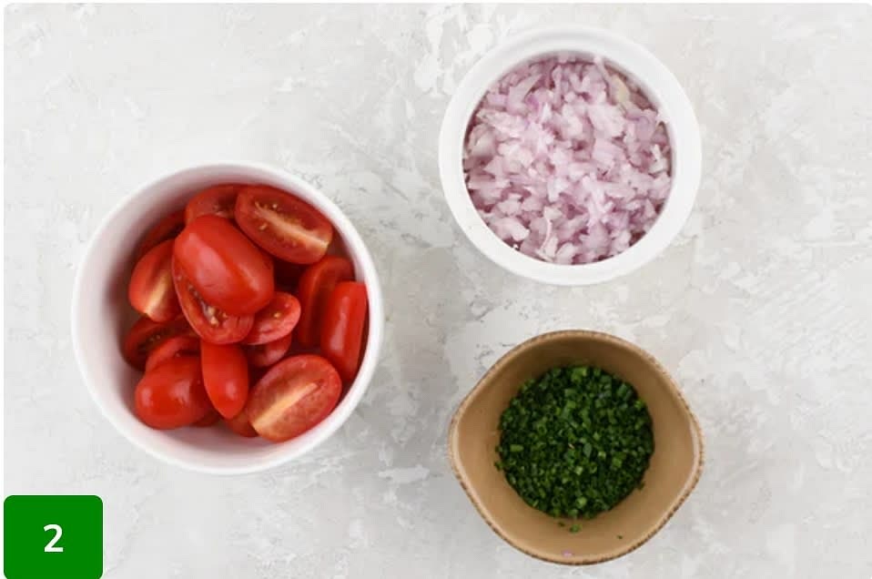 Prepare the Ingredients: Halve tomatoes. Thinly slice chives. Peel and mince shallot. Pat steaks dry and season both sides with 1/4 tsp. salt and a pinch of pepper.