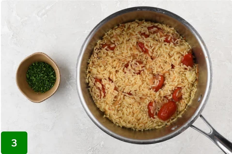 Finish the Orzo: Return pot used to cook orzo to medium-high heat and add 1 tsp. olive oil. Add shallot and a pinch of salt to hot pot and stir occasionally until tender, 1-3 minutes. Stir in wine until combined, 30-60 seconds. Adding alcohol to a hot pot may cause some flames; use caution. Add tomatoes and stir occasionally until tomatoes release juices, 1-3 minutes. Remove from burner. Stir in orzo and 1/4 tsp. salt until combined. Cover and set aside.