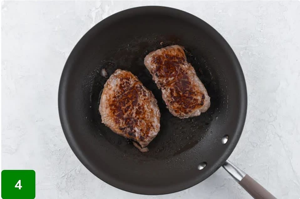 Cook the Steaks:
Place a medium non-stick pan over medium heat and add 2 tsp. olive oil. Add steaks to hot pan and cook until steak reaches desired doneness, or 4-6 minutes per side for medium/medium-well. Steak thickness can vary; if you receive a thinner steak, we recommend checking for doneness sooner. Remove from burner and remove steaks to a plate. Rest, 3 minutes. Wipe pan clean and reserve.