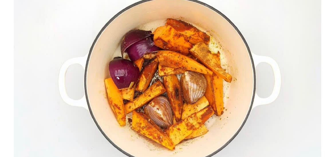 Add the ground cumin, smoked paprika, dried oregano and crushed garlic to the dish and stir it all up.