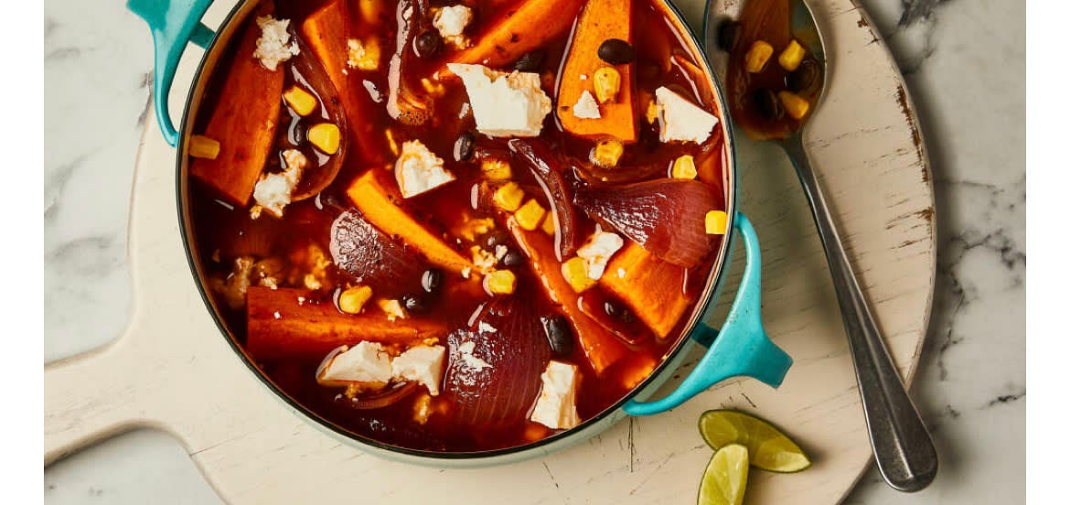 To serve, squeeze the juice of 1/4 lime per serving into the oven-baked Mexican sweet potato & corn broth and give it a good mix up. Cut the remaining lime into wedges Sprinkle the feta on top and garnish with the lime wedges. Let everyone dig in!