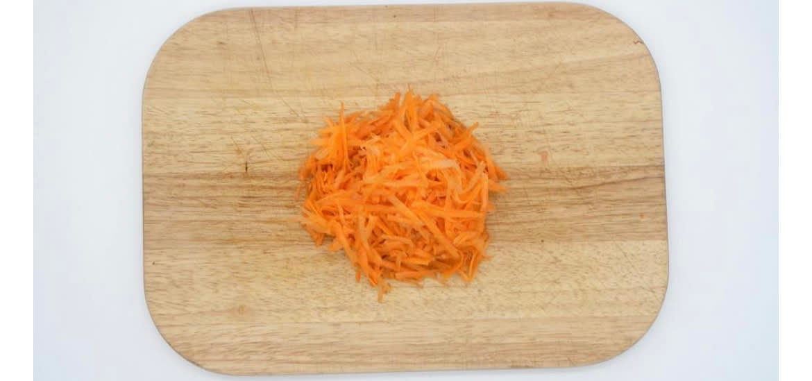 Now, let's get started! Preheat the oven to 220°C/ 200°C (fan)/ gas 7. Boil a kettle. Top, tail and grate the carrot[s].