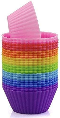 LINE - Insert 12 cupcake liners into muffin tin. I like to use silicone baking cups. Lightly brush each cup with oil.