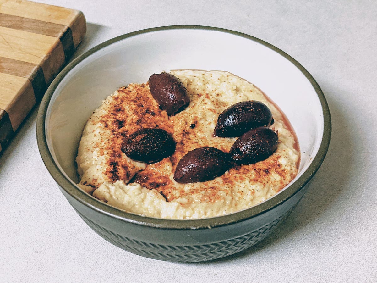 Best served at room temperature. Garnish with a bit of olive oil, Kalamata olives, a few shakes of paprika, and/or sprigs of parsley. Great on water crackers, fresh bread, carrots, or on a turkey sandwich.