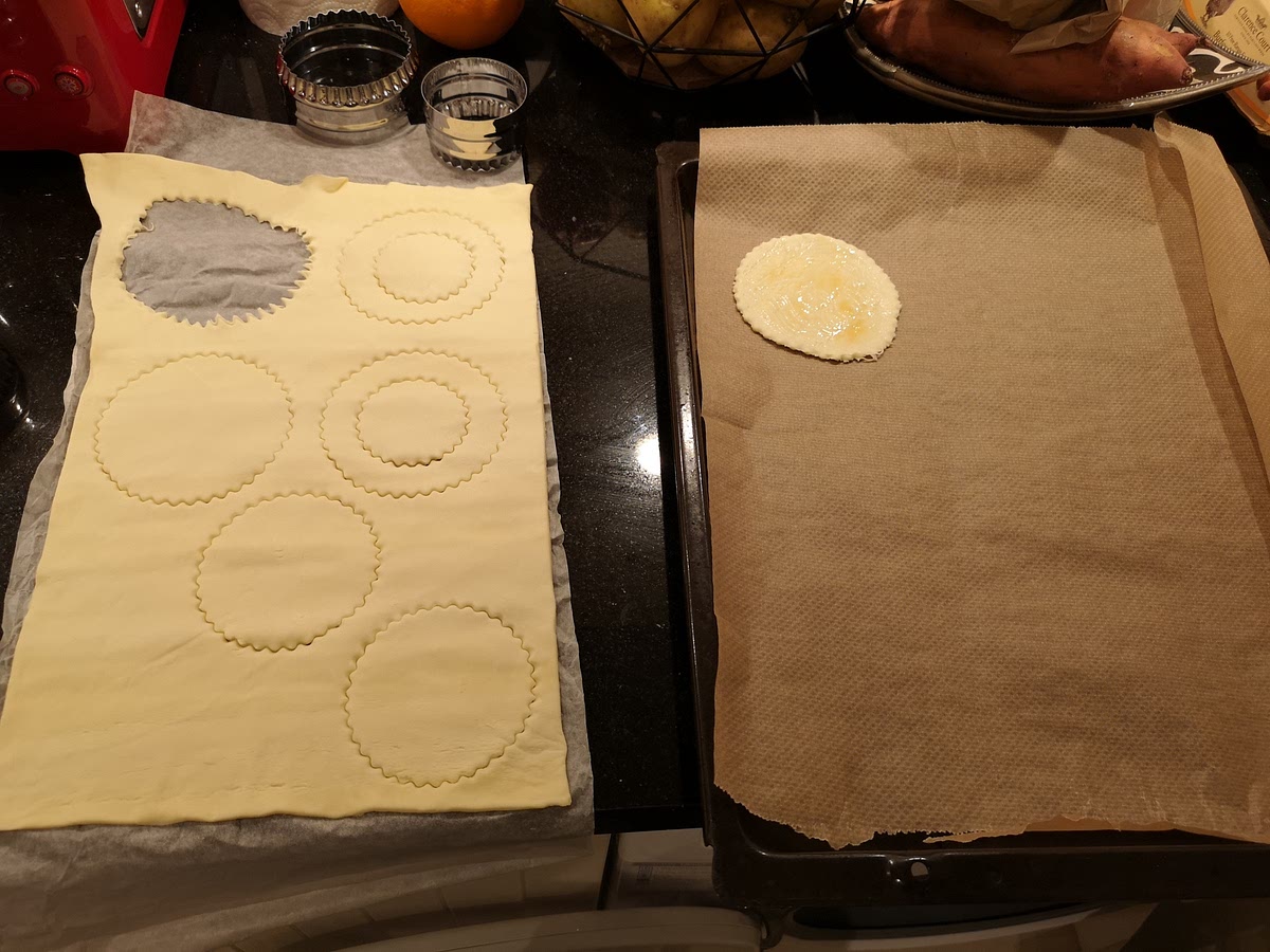 For 4 vol au vent cases, make 8 circles into the puff pastry. For 4 of the circles, put another small circle into them