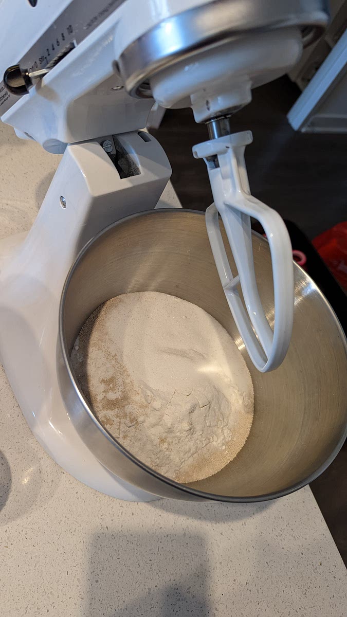 Mix flour, sugar, salt and yeast