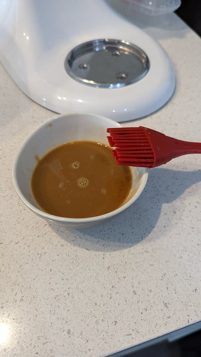 For brushing, add an egg with a teaspoon of sugar(brown preferably) and 2 tblsp of milk in a cup