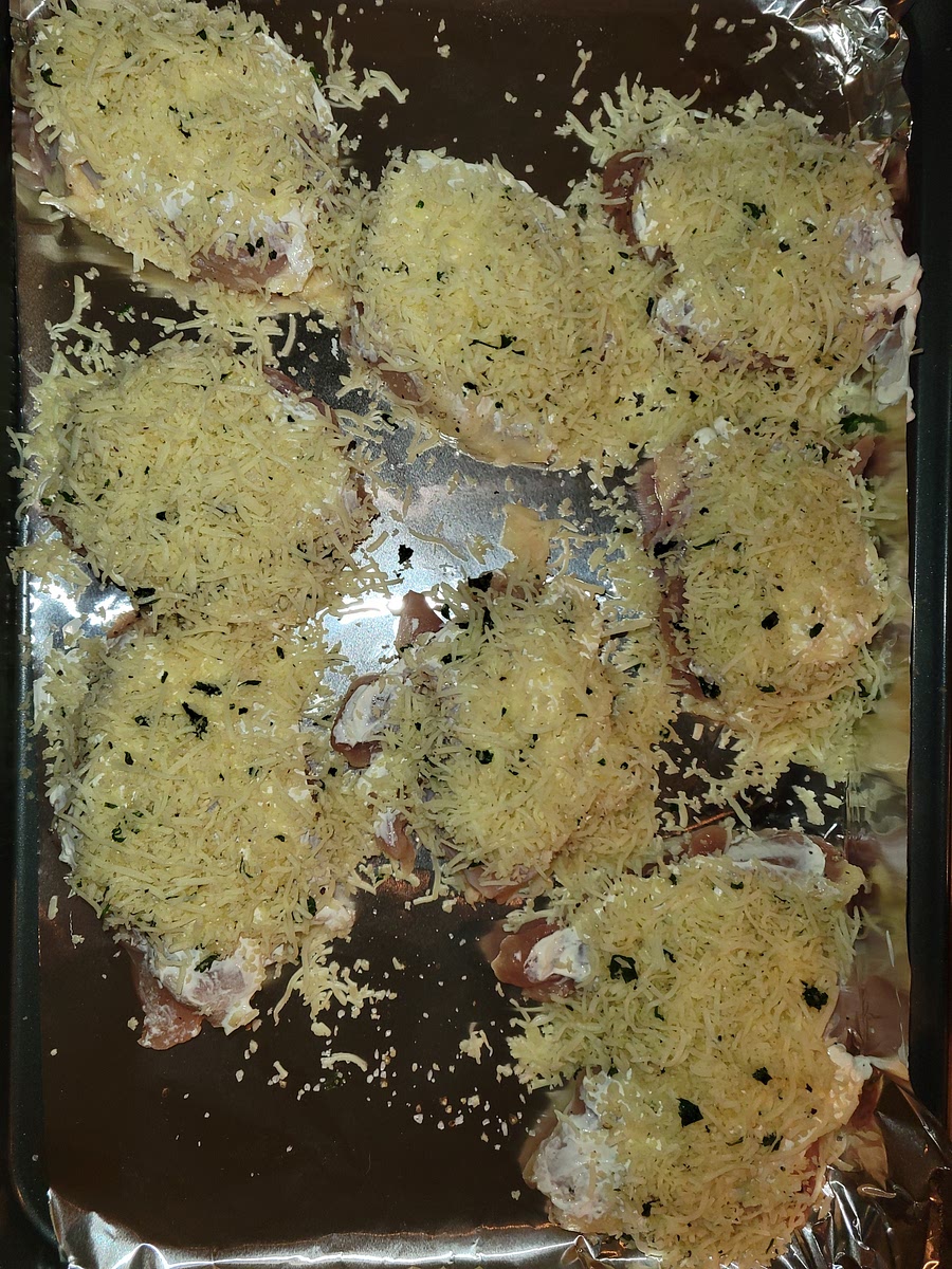 Pat Chicken dry with paper towels. Season with salt and pepper. Evenly spread sour cream onto the top of chicken, then mound with panko mixture. Press firmly.