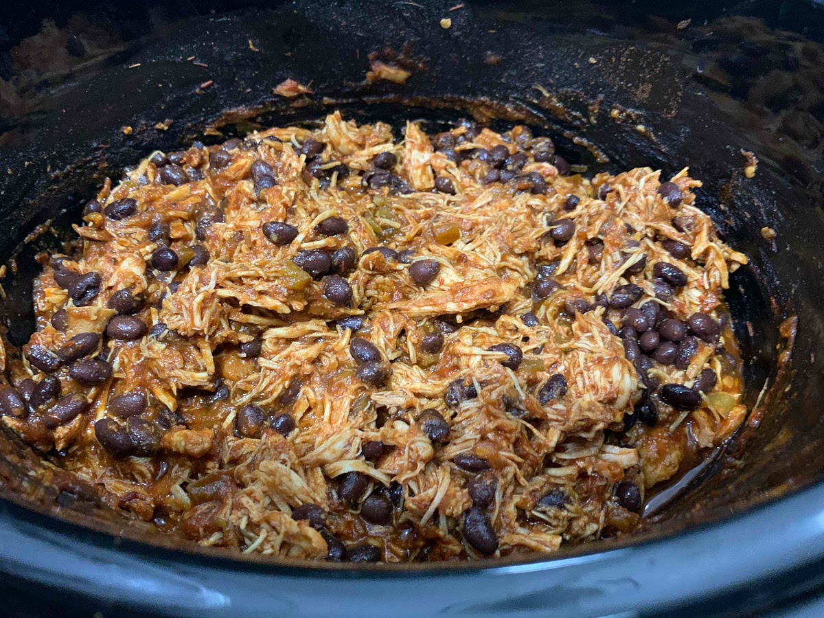 Drain and pour can of black beans into slow cooker