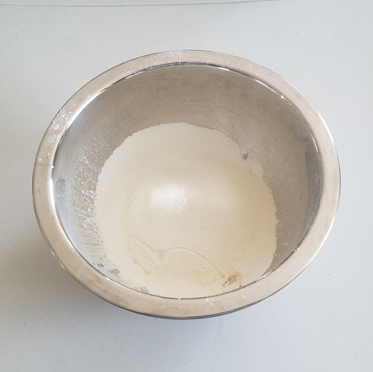 In a large bowl, combine dry ingredients, leaving the sugar out