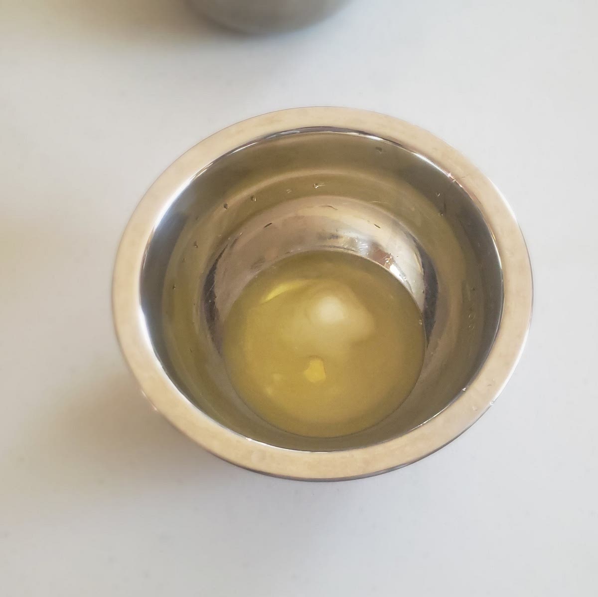 In a small jar or bowl, mix egg whites and sugar