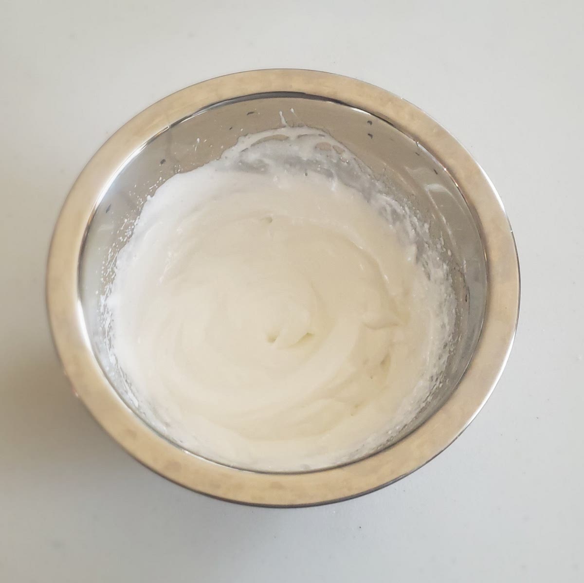 Whisk vigorously, until white and fluffy