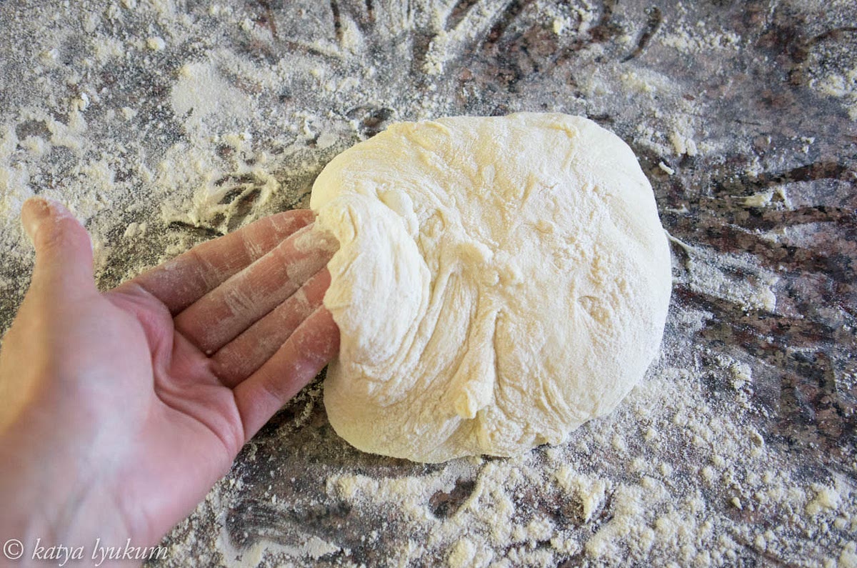 Preheat the oven to 450F with a stone inside. Do not shape Khachapuris until your oven is ready. If the dough waits to be baked for too long, it will moisten the flour dust and stick to the peel.