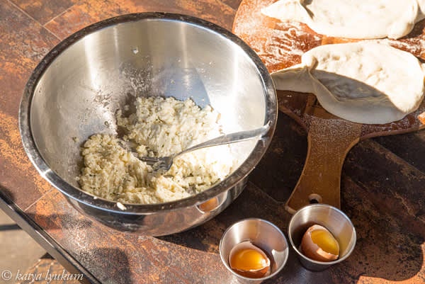 Fill dough "boats" with cheese mixture and place into the oven with the silicone mat.