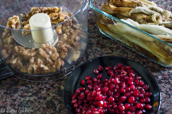 In the U.S., I prefer Asian eggplants. Score and grill/broil them until soft and charred. Peel the skin and chop the flesh.