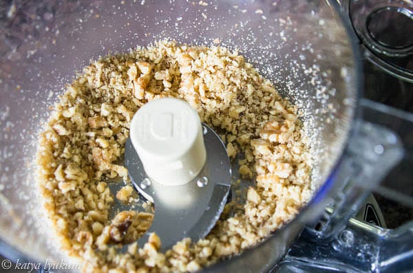 Chop walnuts and toast them on a hot skillet till fragrant, for about a minute, stirring.