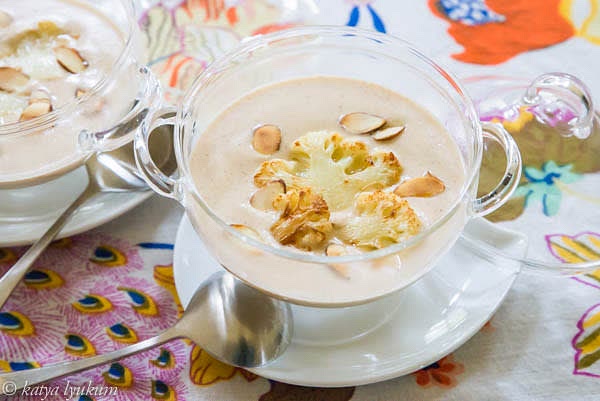 Blend hot soup at high speed. Adjust the seasoning and the thinness of the soup to your taste. Serve with reserved toppings.