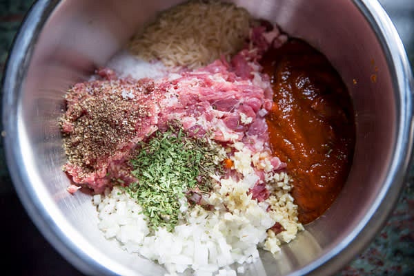 In a bowl, measure and add all the ingredients except for water. Mix and knead for a few minutes.
