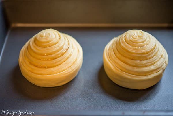 After the second fermentation, the buns will double in size. The oven should be hot at this time.