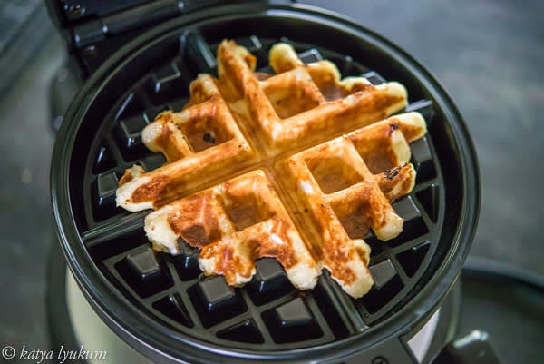 Preheat waffle maker (setting 5 for Warring Pro, it beeps and turns the green indicator on when ready). Scoop a portion of dough in the center, press, and cook for about 1.5 minutes (Warring Pro beeps when the waffle is cooked).