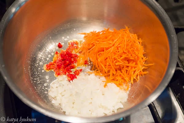 In a sauté pan, melt 1 tbsp butter on medium heat. Add onions, carrots, and Fresno. Season and sauté till soft and fragrant, for about 1-1.5 minutes.