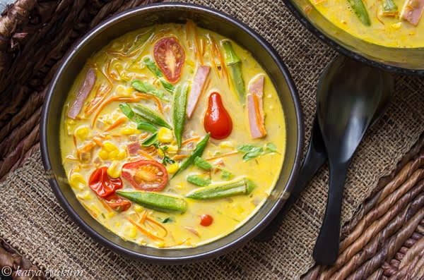 Serve hot topped with halved cherry tomatoes. Add grilled or toasted ciabatta slices and herbs flowers if available.