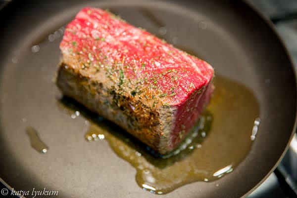 Place a skillet on high heat and add 1 tbsp of vegetable oil with a high smoking point. When hot, sear tenderloin on 4 sides, turning every minute for about 8 minutes.