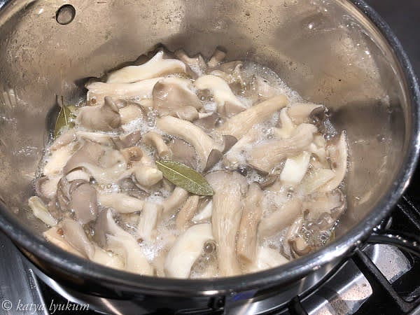 Bring the marinade back to simmer and add mushrooms. Stir to coat them with hot marinade. Soon, the hot temperature, salt, and sugar will draw their juices, and all mushrooms will be submerged in a liquid. Stir them again to redistribute the marinade and let simmer for another 15 minutes.