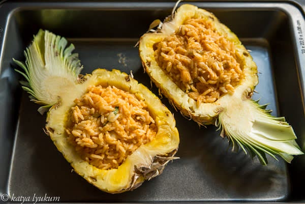 Fill pineapple boats with the mixture and arrange seafood on top. (Up to this step, all preparations can be done in advance, each portion wrapped in foil and refrigerated.)