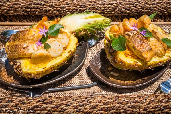 Bake pineapple boats in preheated 400F oven for 5 minutes and serve. OR Preheat oven 350F. Unwrap refrigerated pineapple boats, bake until 145F inner temp, and serve.