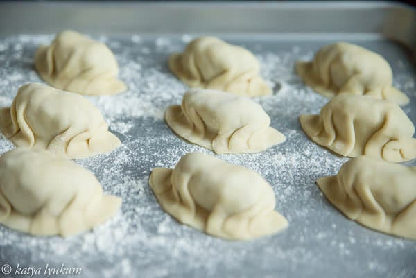 Dust baking sheet with some flour, place potstickers so they do not touch each other, and freeze. They can be placed in closed containers or zip-locks for more extended storage in the freezer when completely frozen.