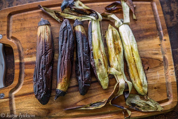 Grill on high heat until completely soft and with charred skin. Let them cool down to room temperature, cut off the stem, and peel.