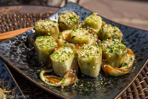 Slice peeled eggplant across to 1" long portions and serve them vertically with some Okonomi sauce and sprinkled with salt and furikake.