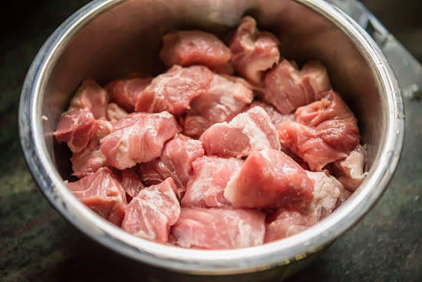 Cut pork into ~2-inch cubes and divide all meat into 4 batches.