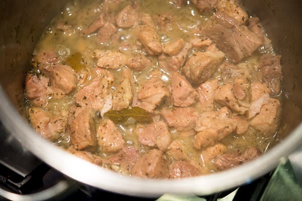 Discard the orange slices and bay leaves. Most of the liquid should evaporate by this time.