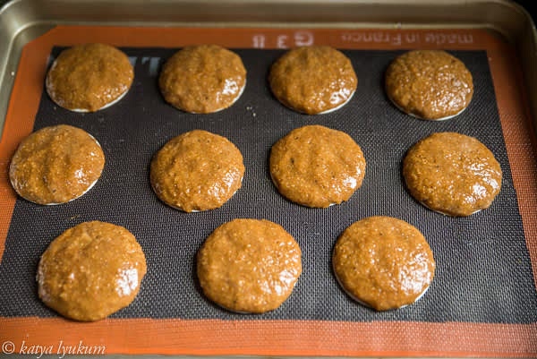 Use your wet fingers to press and spread the dough on each rice wafer round.