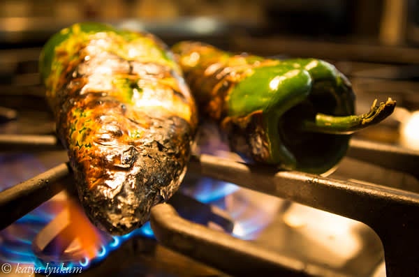 Char poblanos and tomatillos. Peel, remove seeds.