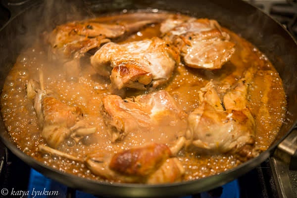 Before serving, place rabbit portions into the skillet with the sauce and reheat them by basting.